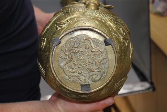 A pair of Chinese gilt bronze vases, decorated with dragons in relief, height 41cm